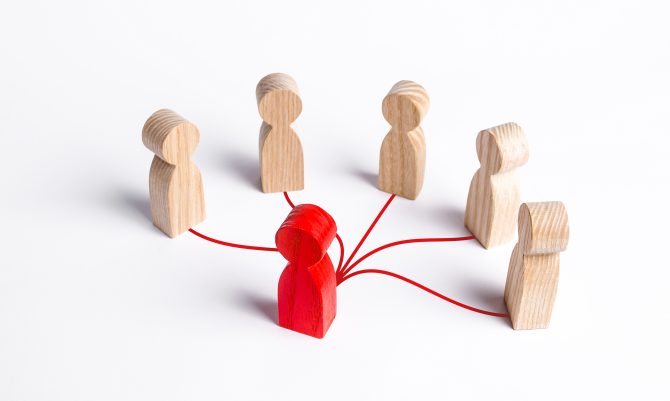 The red human figure is connected by lines with five persons. Business management. Spreading rumors. Leadership, teamwork. Cooperation and collaboration. Shares experiences and information.